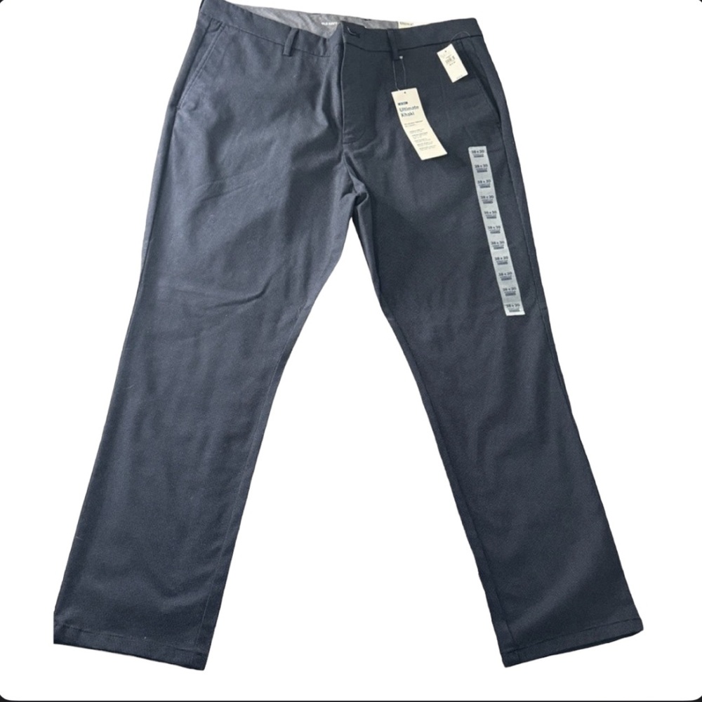 NWT 38x30 men’s dress up pants. Very dark blue with small grayish dots.